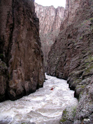 A kayaker in Sheep Creek Canyon