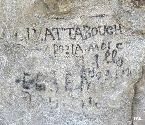 Signatures written in axle grease at Register Rock on City of Rocks National Preserve, along the California Trail in Idaho