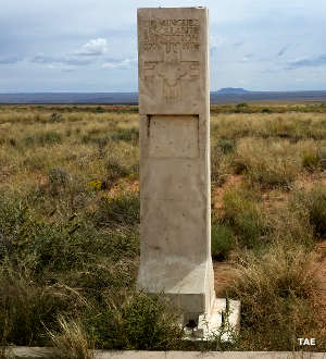 A granite post marking the Dominguez-Escalante Trail Route along the Old Spanish National Historic Trail
