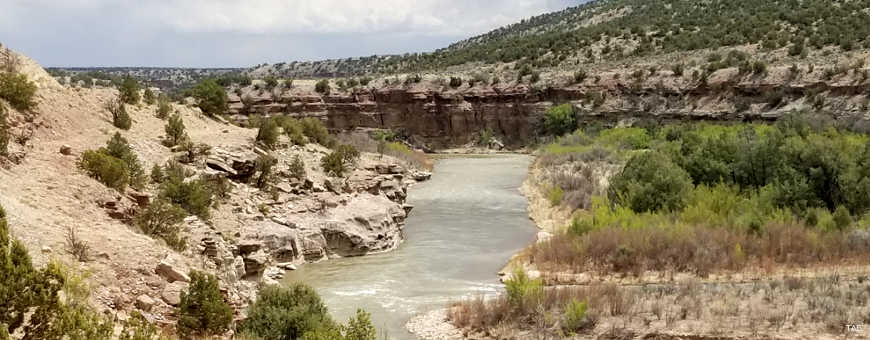 Looking across the valley of the Rio Chama Wild and Scenic River just downstream of the Crist in the Desert Monastery
