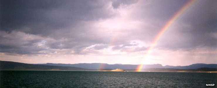 Heron Lake State Park: View of a rainbow above the lake A rainbow over Heron Lake State Park