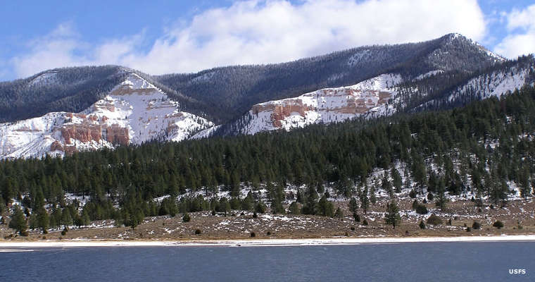 Dixie National Forest: A view of Pine Lake Looking across Pine Lake into snow-covered hills in Dixie National Forest