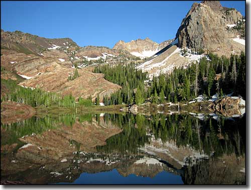 Big Cottonwood Canyon Scenic Byway: A view of Sundial Peak along the route Sundial Peak rises above Lake Blanch along the Big Cottonwood Canyon Scenic Byway