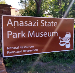 Entry sign at Anasazi State Park Museum