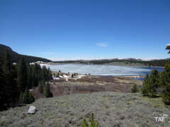 Looking across an ice-covered lake in the flat area atop the Bighorn Mountains