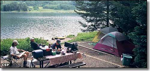 A forest and lake view in the campground at Pearl Lake State Park
