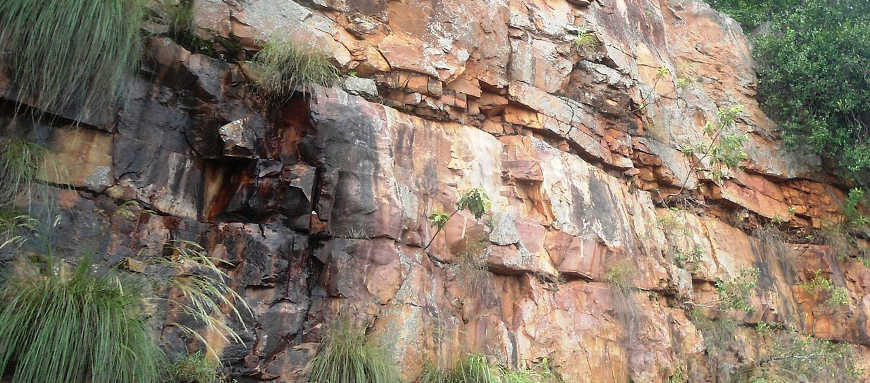 A cliff composed of rock laid down during the Archean Eon