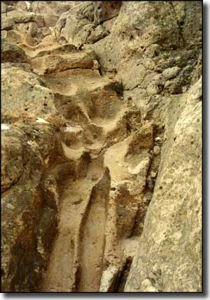 An ancient stairway cut into the volcanic tufa at Puye Cliff Dwellings