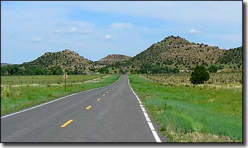 The Rabbit Ears flank the road near the Oklahoma State line