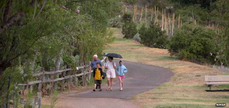 A family on a foot path