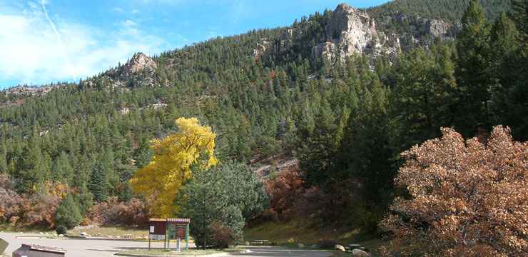 Granite pillars, autumn leaves and evergreen forest in Cimarron Canyon State Park