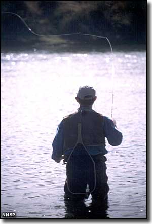 A fisherman working the San Juan River near Navajo Lake State Park