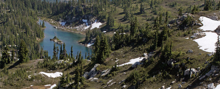 Looking down to a cirque lake high in mountains in Henry M. Jackson Wilderness